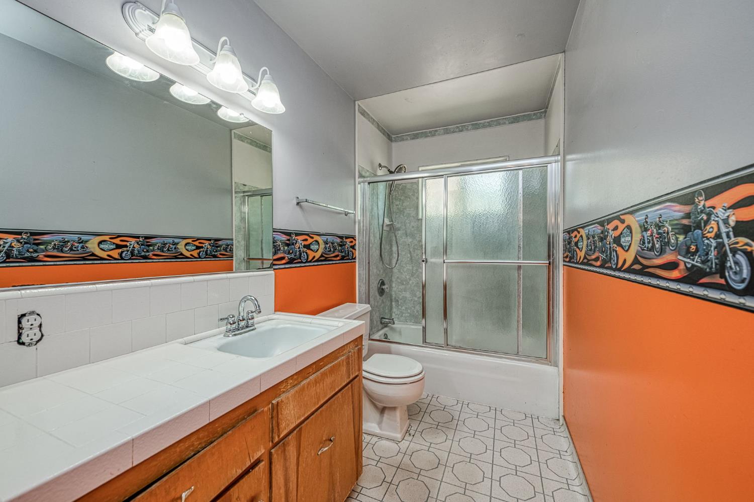 5578 Perrin Road Clovis, CA 93619 - Photo 30 of 62 a bathroom with a sink a toilet and shower