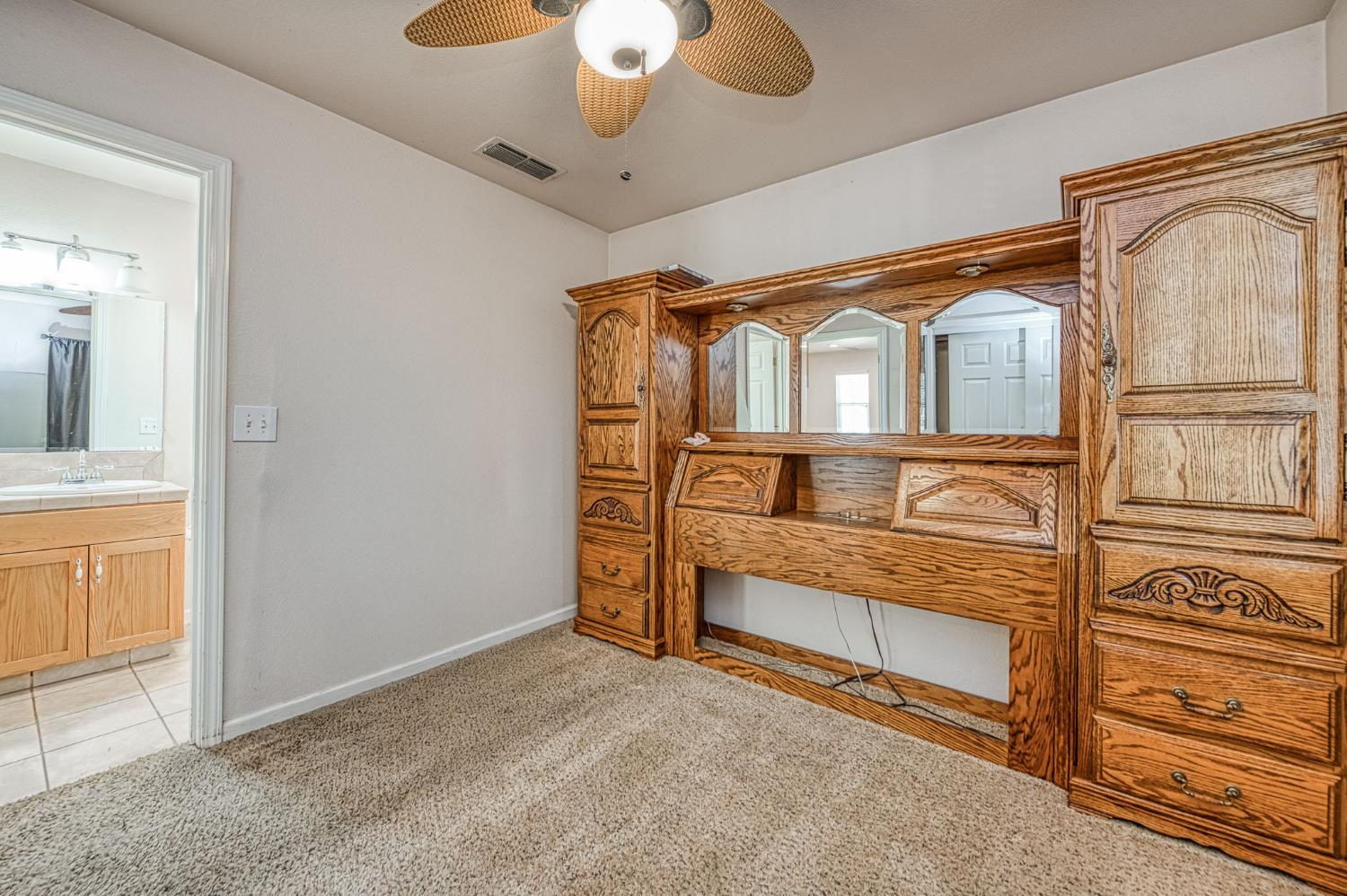 5578 Perrin Road Clovis, CA 93619 - Photo 39 of 62 an empty room with wooden floor closet and windows