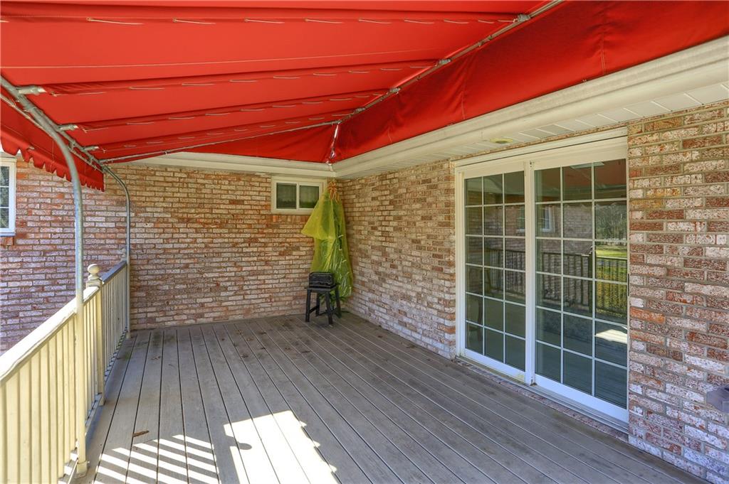 3912 Shepard Road Gibsonia, PA 15044 - Photo 24 of 25 Side covered deck, with sliding glass door.