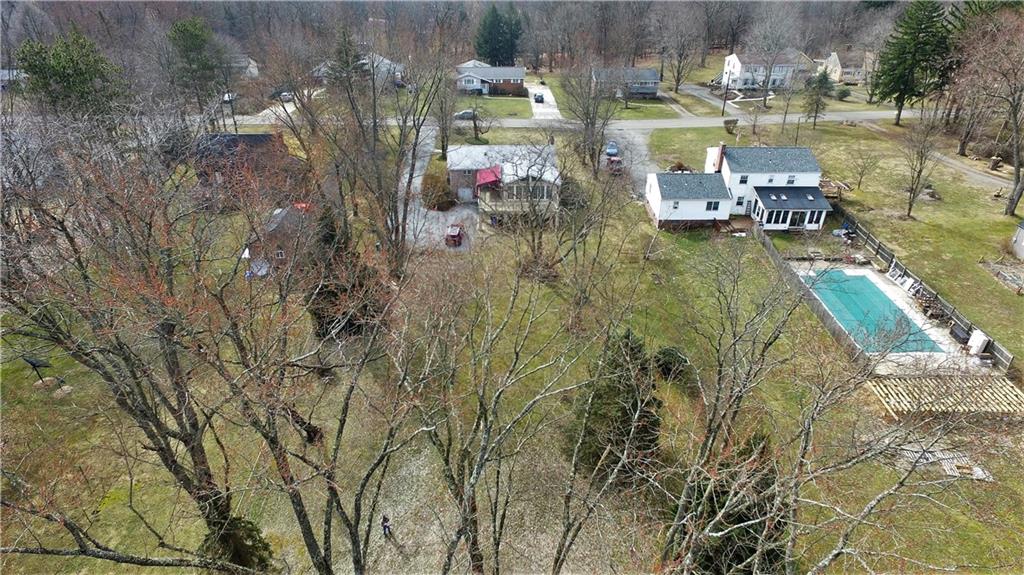 3912 Shepard Road Gibsonia, PA 15044 - Photo 25 of 25 From this view you can see the quiet front street, as well as the large space between homes, and exactly how much back yard this home offers. As you can see from the neighbors home there is plenty of room for a swimming pool!