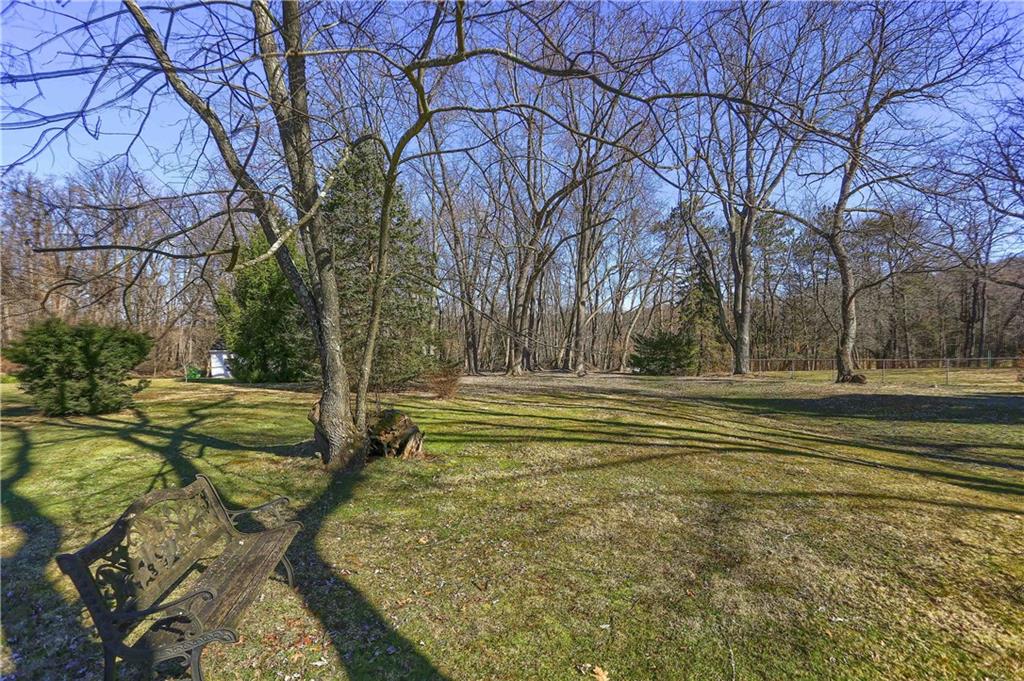 3912 Shepard Road Gibsonia, PA 15044 - Photo 4 of 25 1-Acre of flat, private backyard! No homes to look at, just beautiful foliage and wild-life. Sit back on and enjoy the feeling of country living in the suburbs. You'll be hard-pressed to find this type of privacy and terrain!