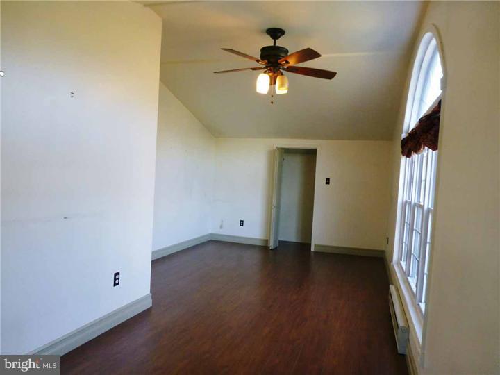 68 Bethel Church Road Spring City, PA 19475 - Photo 21 of 23 a view of room with hardwood floor and ceiling fan