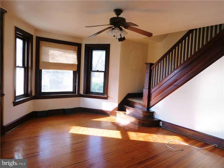 68 Bethel Church Road Spring City, PA 19475 - Photo 8 of 23 a view of an entryway with wooden floor and windows