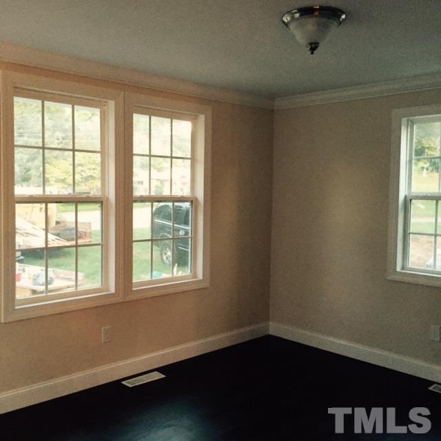 722 Newcombe Road Raleigh, NC 27610 - Photo 6 of 19 a view of a room with a window