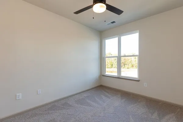 an empty room with window