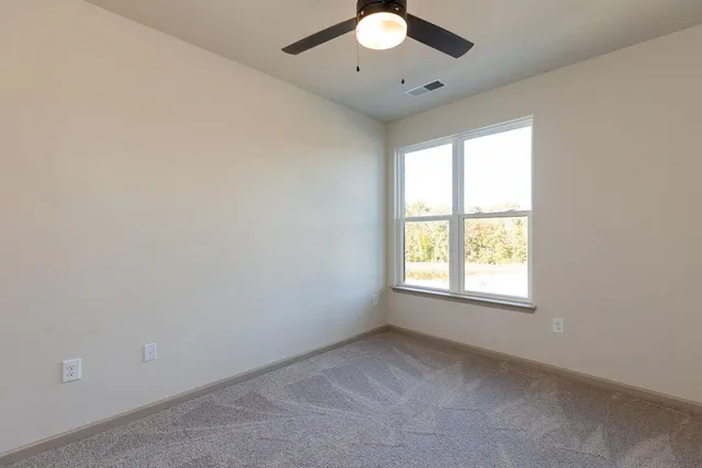 an empty room with window