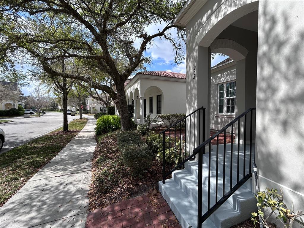 904 Pawstand Road Kissimmee, FL 34747 - Photo 4 of 22 a view of a house with wooden walls and a tree
