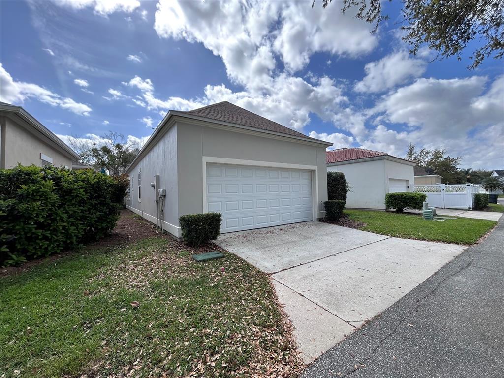 904 Pawstand Road Kissimmee, FL 34747 - Photo 7 of 22 a view of a house with a yard