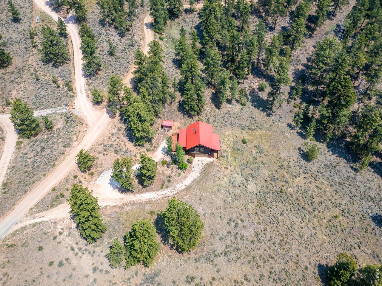 296 Caddo Road Red Feather Lakes, CO 80545 - Photo 36 of 50 Aerial view showing two driveway levels.