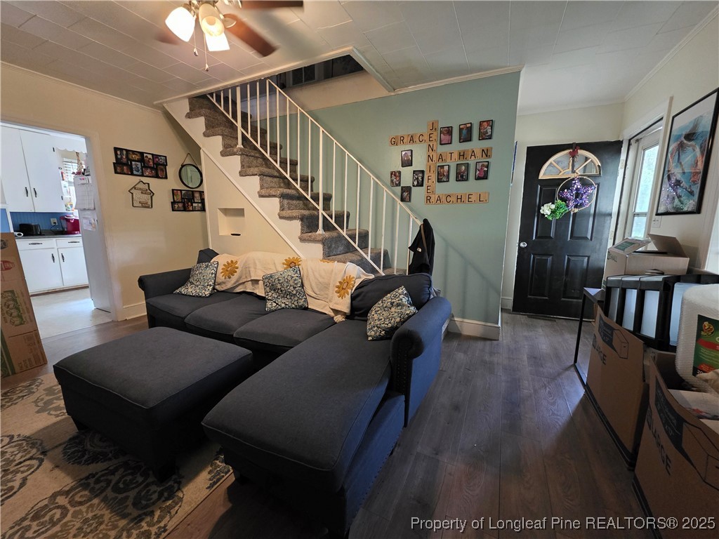 124 North Wright Street Raeford, NC 28376 - Photo 2 of 17 a living room with furniture and wooden floor