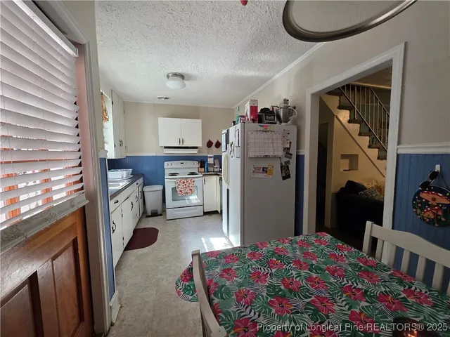 a very nice looking bedroom with a bed