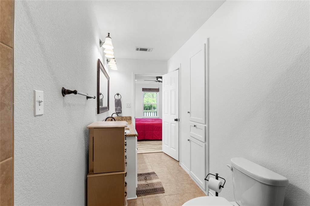 900 Bosque Street Meridian, TX 76665 - Photo 16 of 30 a very nice looking room with a bathroom