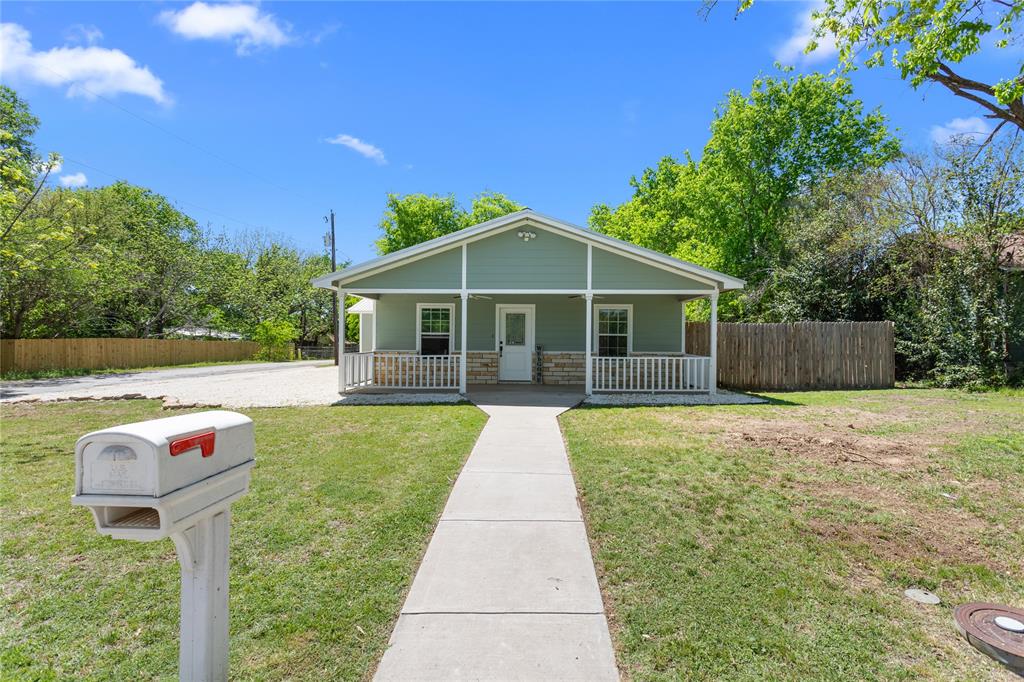 900 Bosque Street Meridian, TX 76665 - Photo 2 of 30 a front view of a house with yard