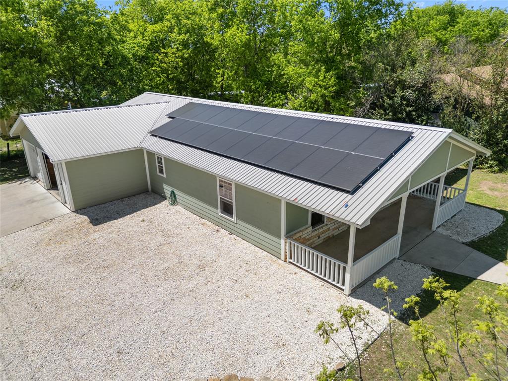 900 Bosque Street Meridian, TX 76665 - Photo 25 of 30 a view of a terrace with a large tree