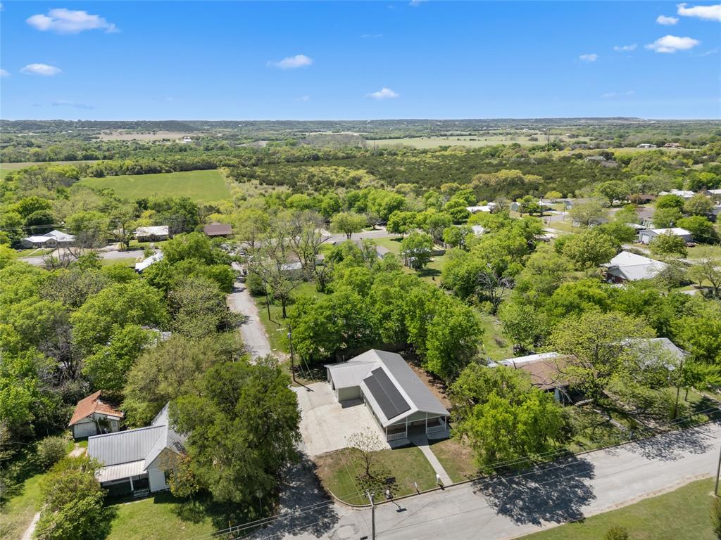 900 Bosque Street Meridian, TX 76665 - Photo 27 of 30 a view of a city with lush green forest