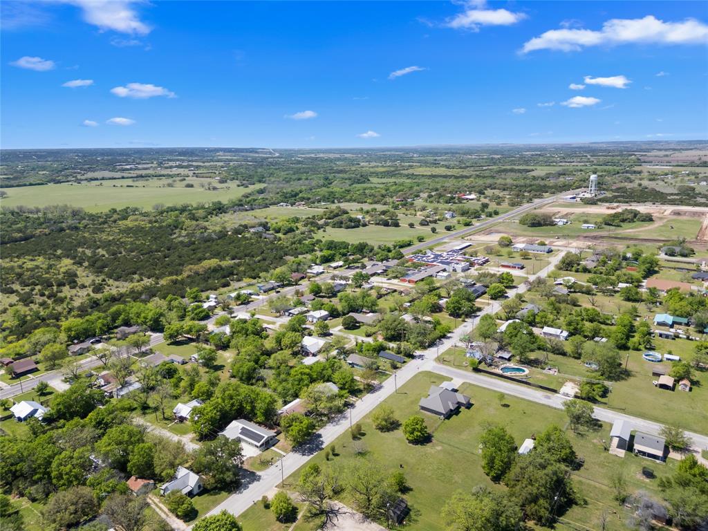 900 Bosque Street Meridian, TX 76665 - Photo 30 of 30 an aerial view of residential houses with outdoor space