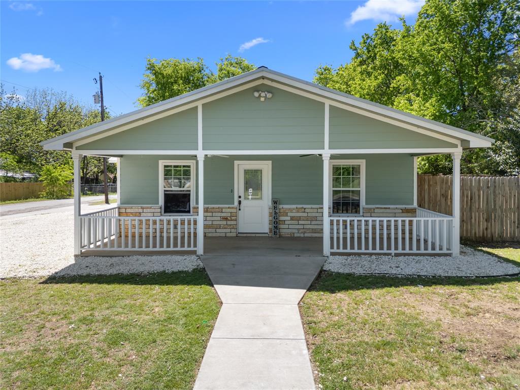 900 Bosque Street Meridian, TX 76665 - Photo 3 of 30 front view of a house with a yard