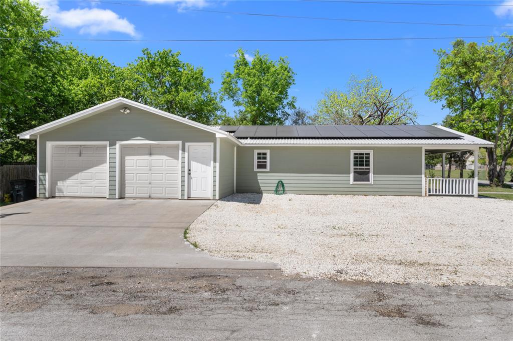900 Bosque Street Meridian, TX 76665 - Photo 8 of 30 front view of a house with a yard