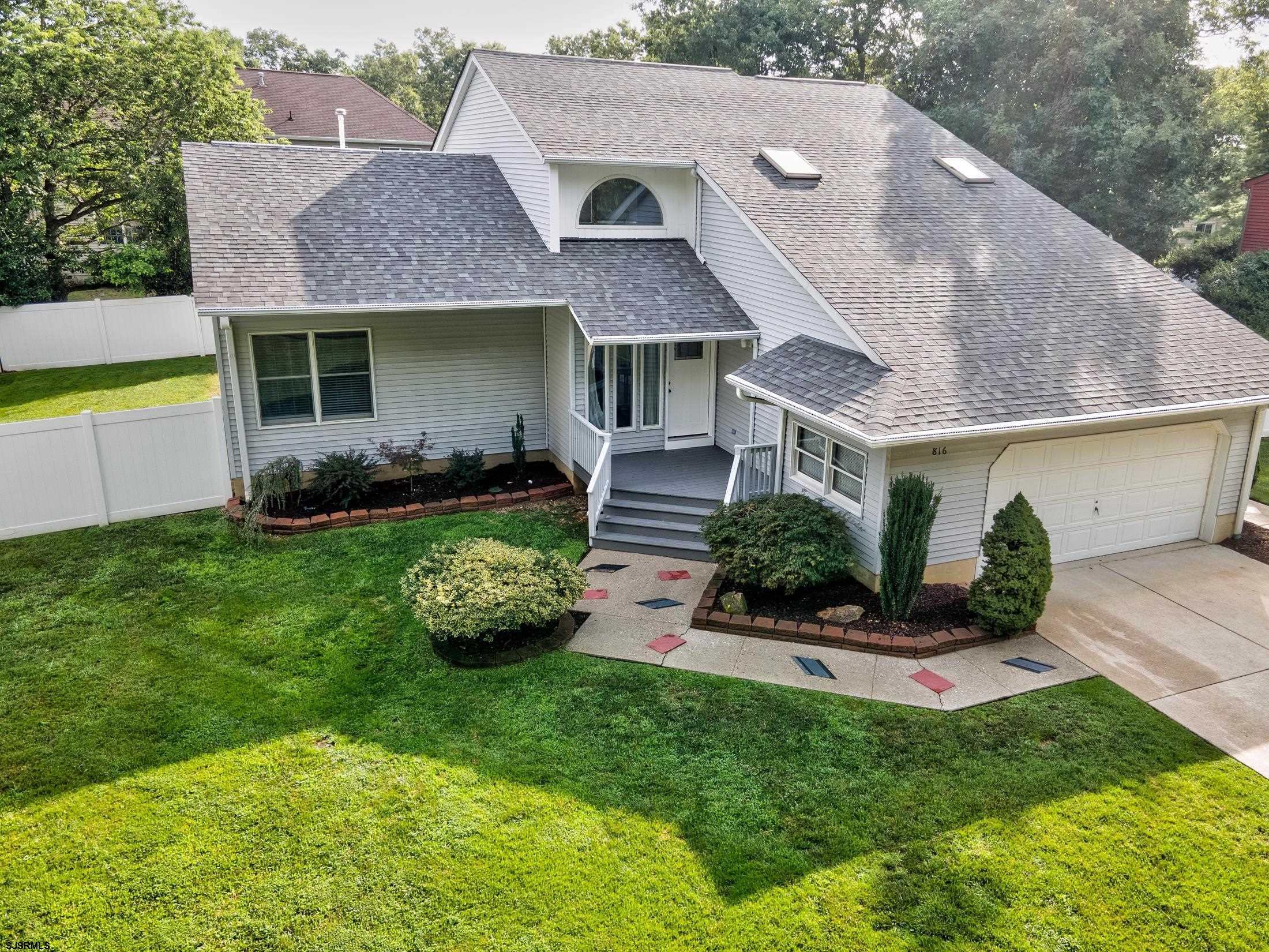 816 Chelsea Road Absecon, NJ 08201 - Photo 1 of 41 a front view of a house with a yard and outdoor seating