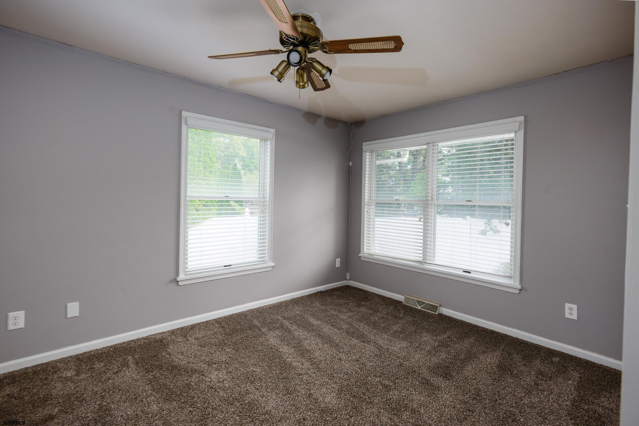 816 Chelsea Road Absecon, NJ 08201 - Photo 18 of 41 a view of an empty room with a window