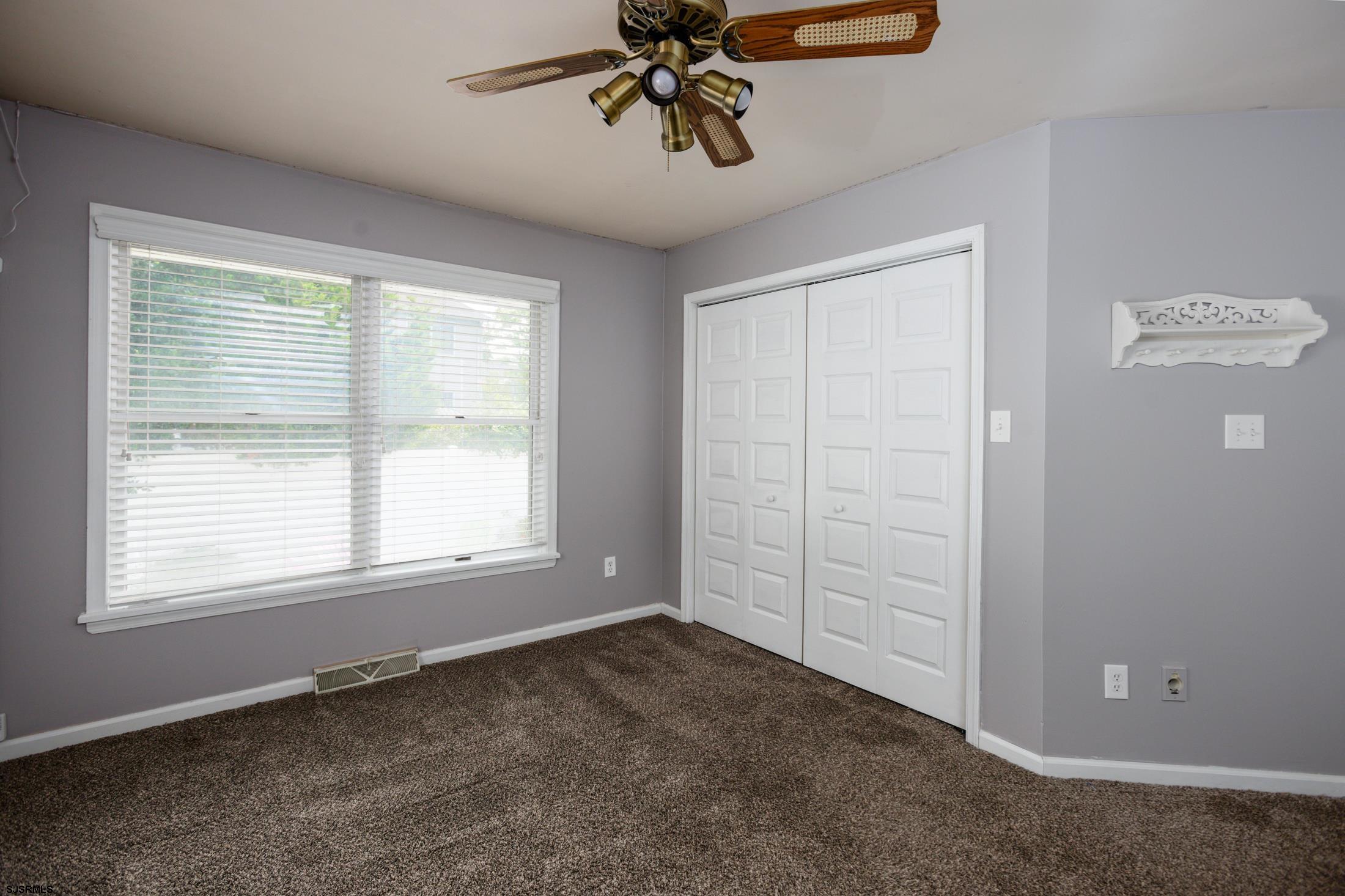 816 Chelsea Road Absecon, NJ 08201 - Photo 19 of 41 an empty room with windows and closet