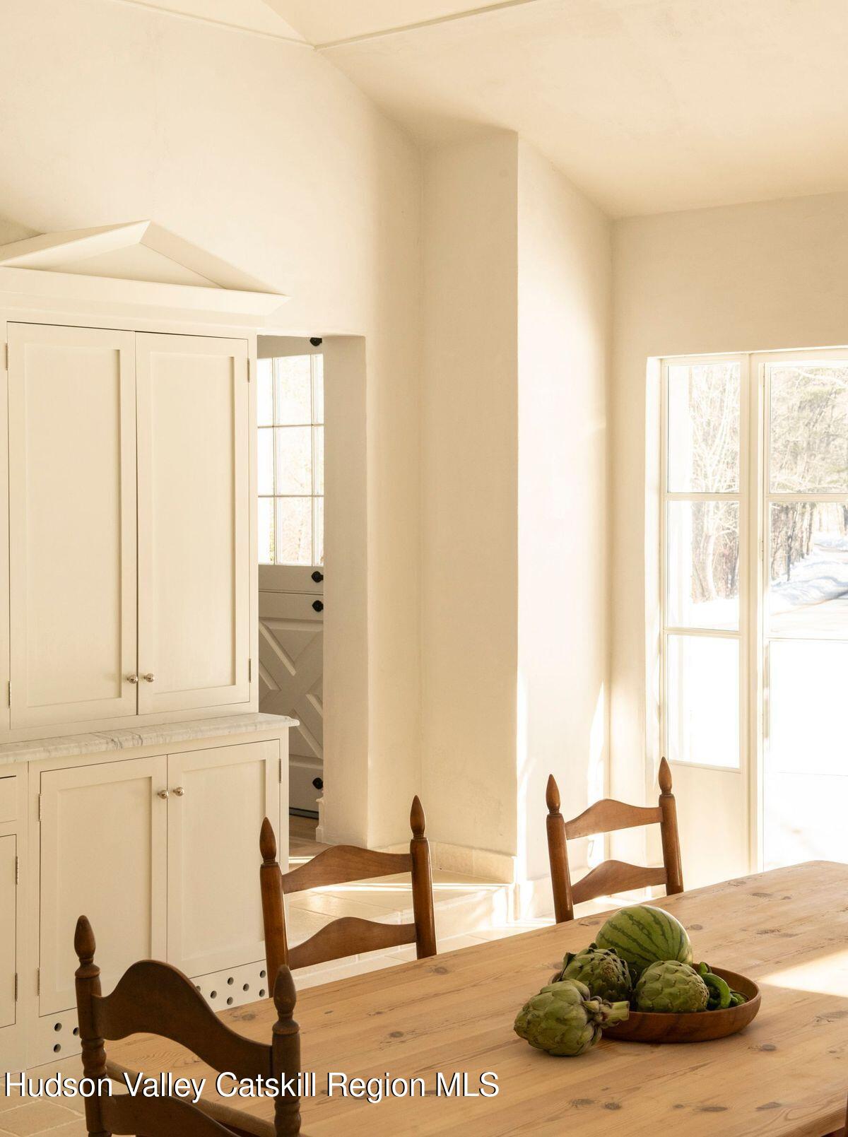 401 Buck Road Stone Ridge, NY 12484 - Photo 11 of 32 a bedroom with furniture and a window