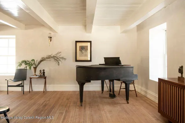 a living room with furniture and a table