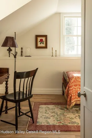 a view of a livingroom with furniture