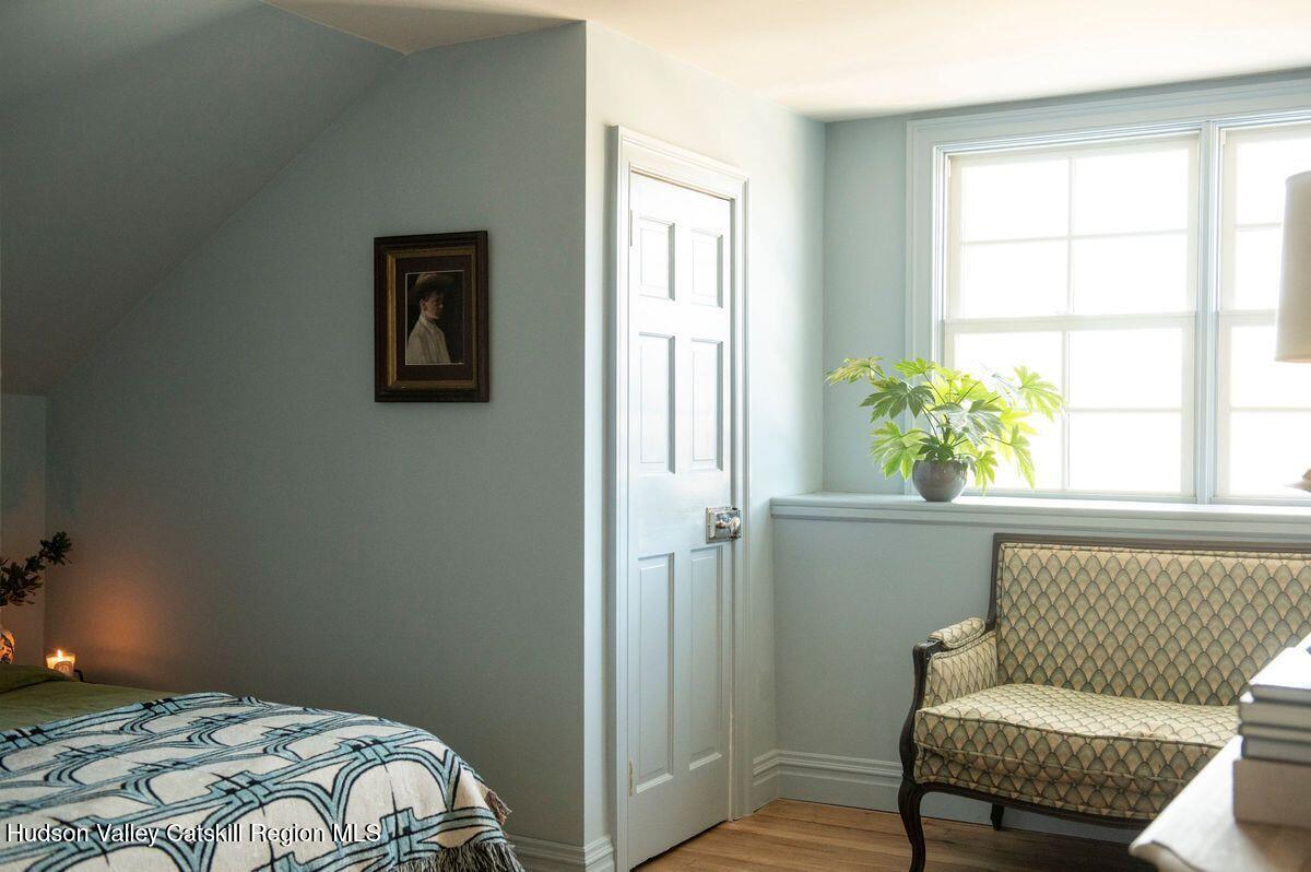 401 Buck Road Stone Ridge, NY 12484 - Photo 29 of 32 a bedroom with a bed and a window