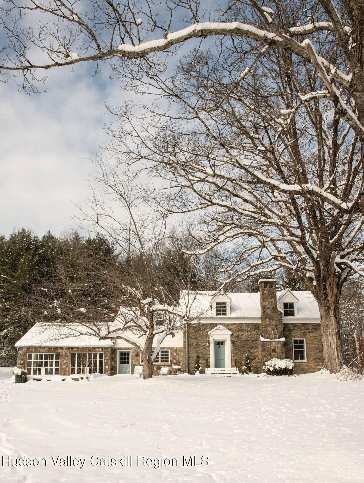 401 Buck Road Stone Ridge, NY 12484 - Photo 32 of 32 a view of a house with snow in the background