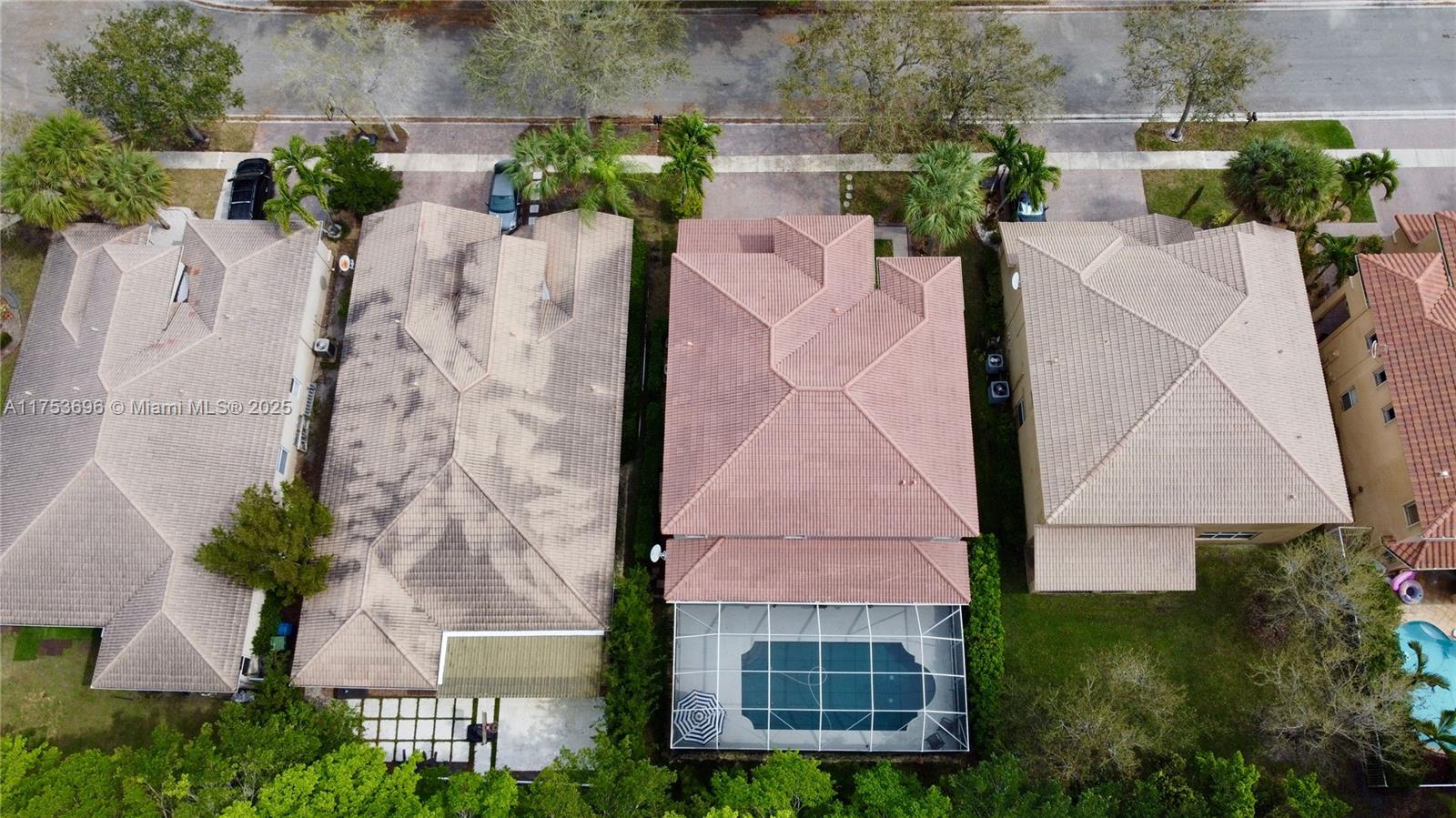 3923 Cascade Terrace Weston, FL 33332 - Photo 72 of 82 an aerial view of a house with garden space and street view