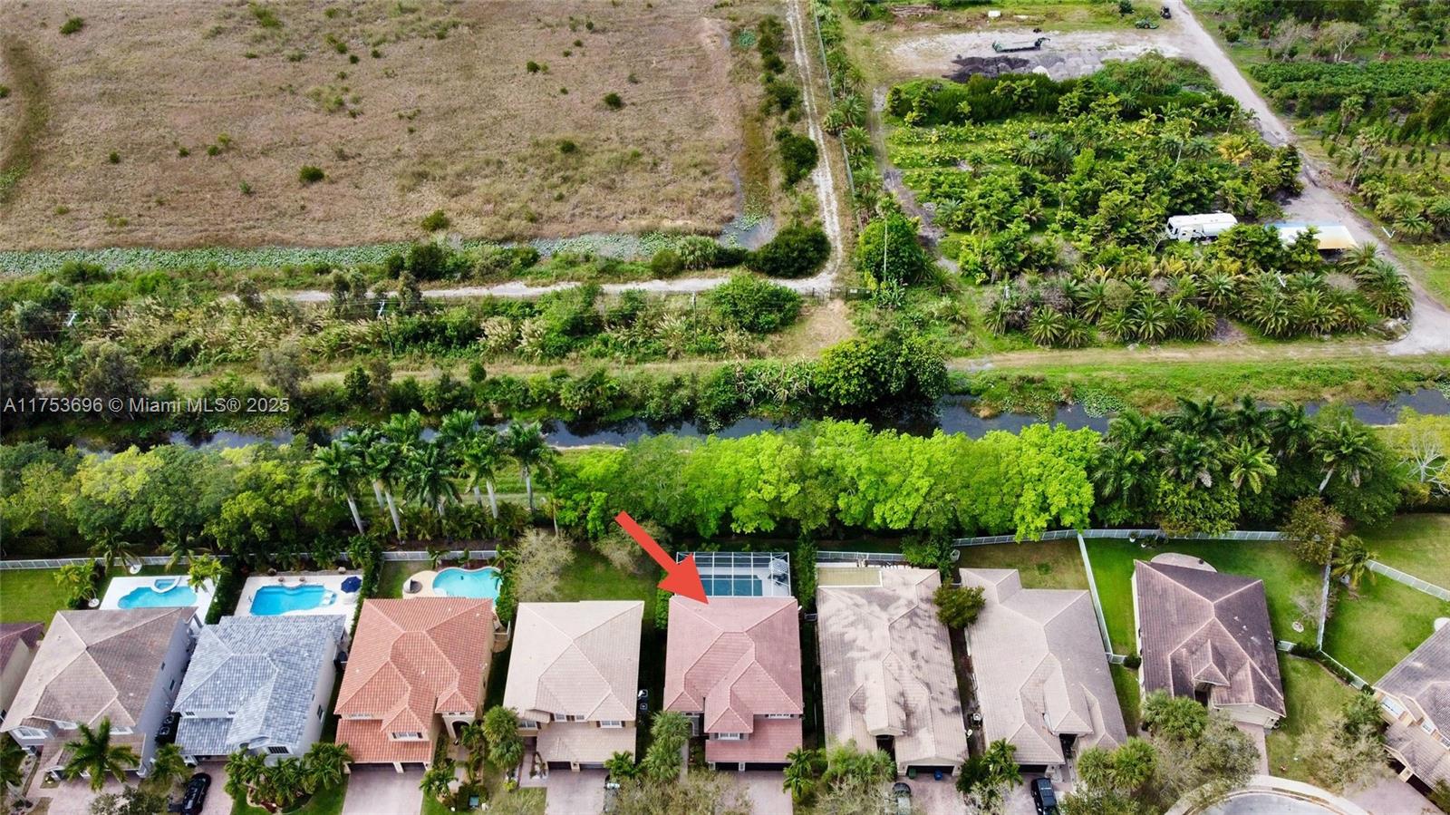 3923 Cascade Terrace Weston, FL 33332 - Photo 73 of 82 an aerial view of a house with a yard basket ball court and outdoor seating