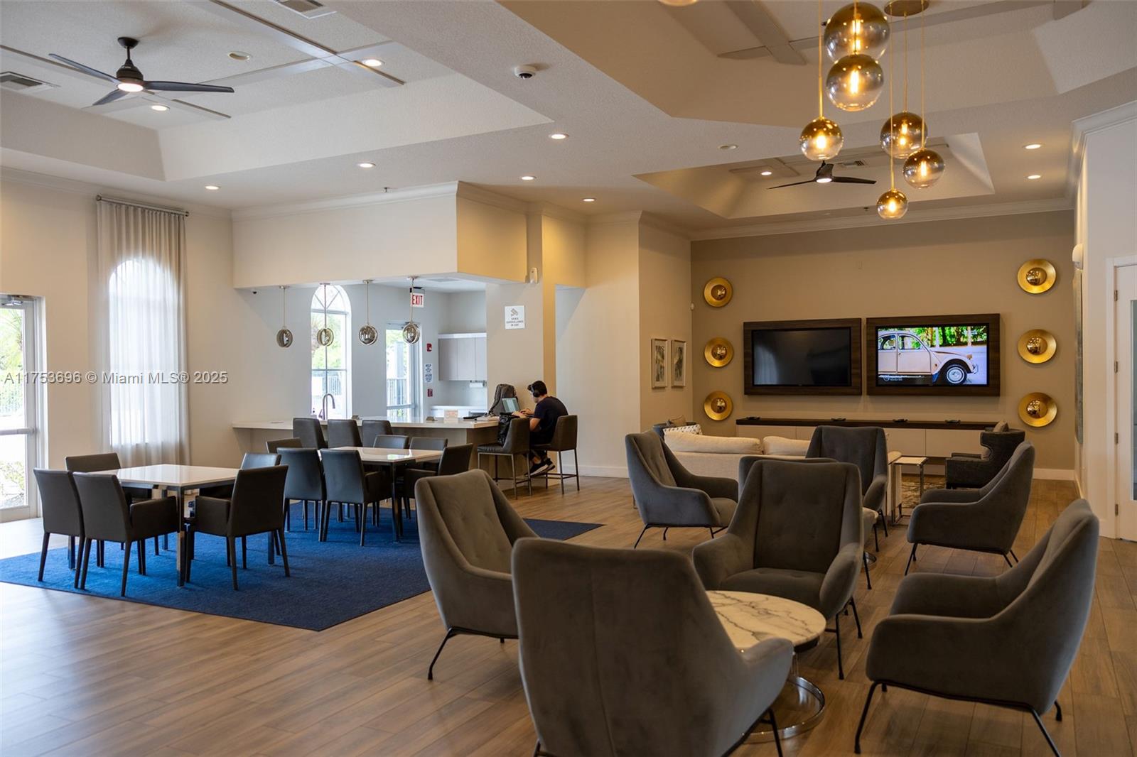 3923 Cascade Terrace Weston, FL 33332 - Photo 79 of 82 a view of a dining room with furniture window and wooden floor
