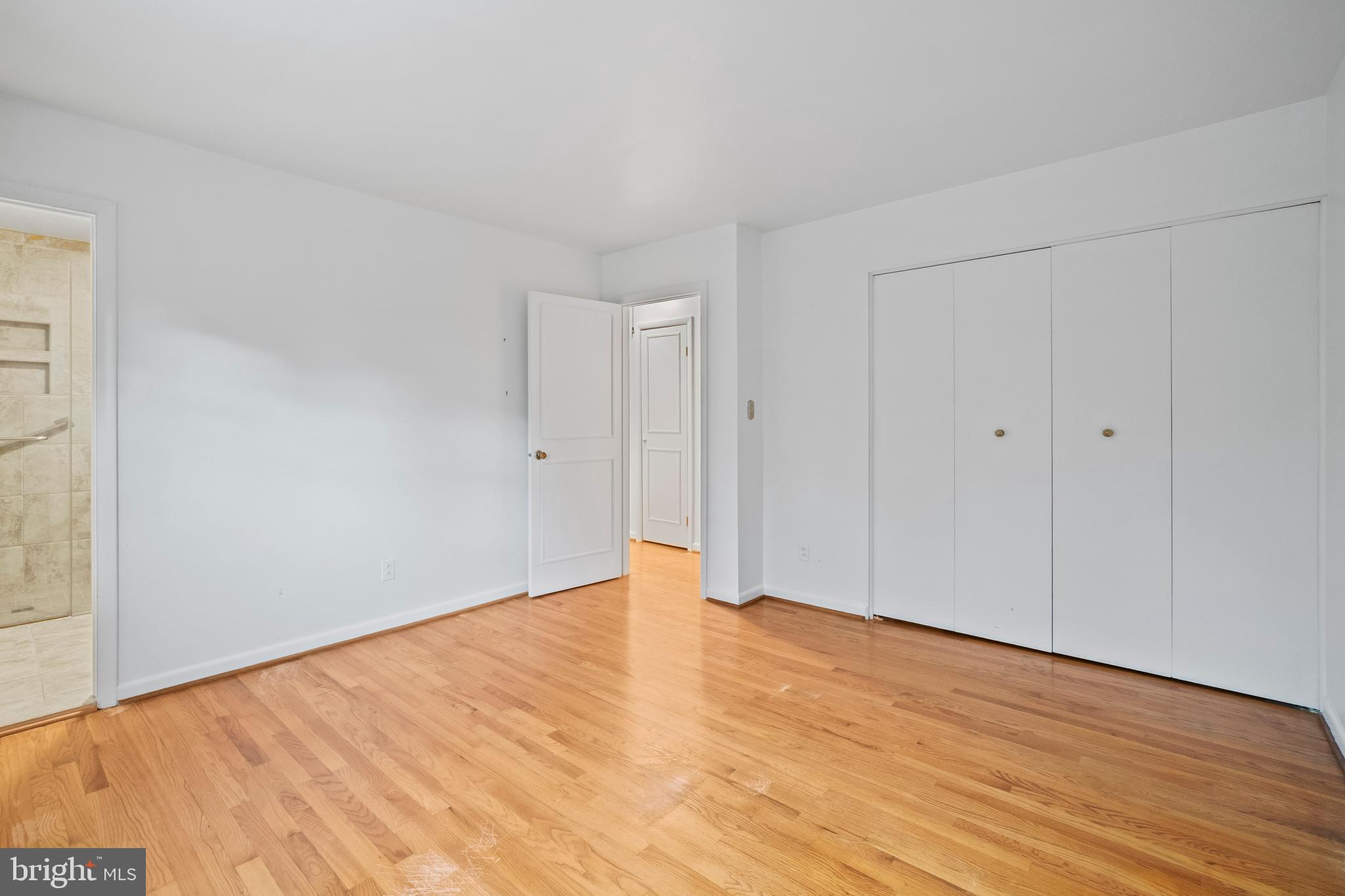 530 Anneslie Road Baltimore, MD 21212 - Photo 19 of 38 a view of an empty room with wooden floor