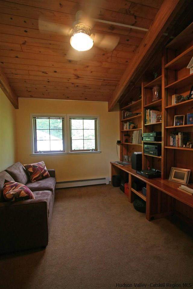 318 Autumn Breeze Road Roxbury, NY 12421 - Photo 24 of 35 a living room with furniture and a window