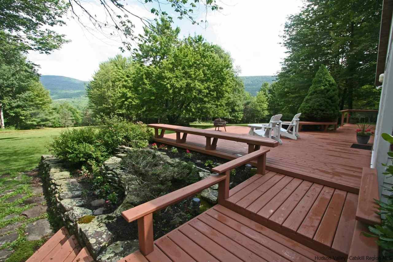 318 Autumn Breeze Road Roxbury, NY 12421 - Photo 5 of 35 a view of deck with seating and trees