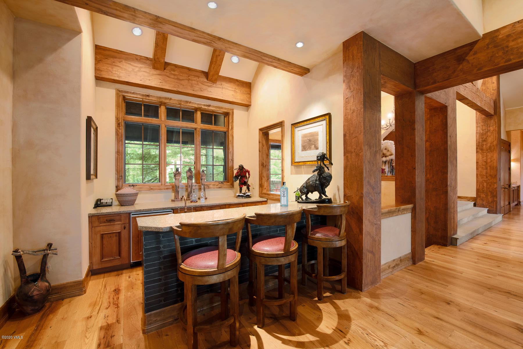 919 Bachelor Ridge Road Avon, CO 81620 - Photo 14 of 31 a view of a kitchen and dining room