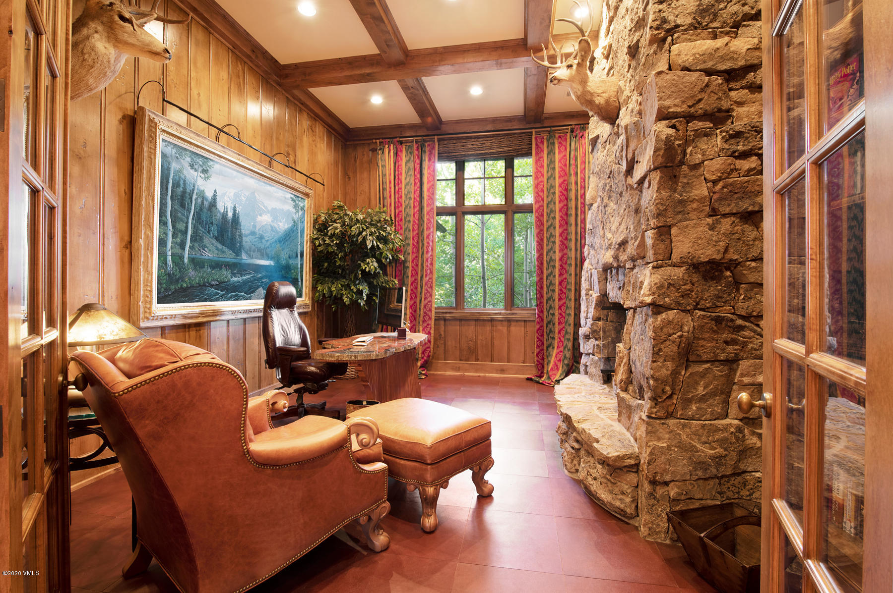919 Bachelor Ridge Road Avon, CO 81620 - Photo 17 of 31 a living room with furniture and a large window