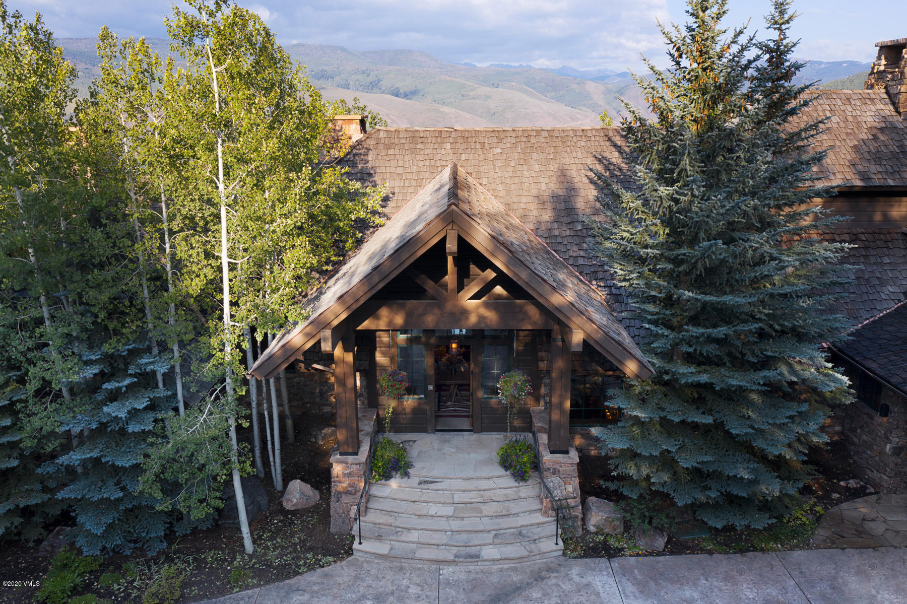 919 Bachelor Ridge Road Avon, CO 81620 - Photo 30 of 31 a front view of a house with a yard