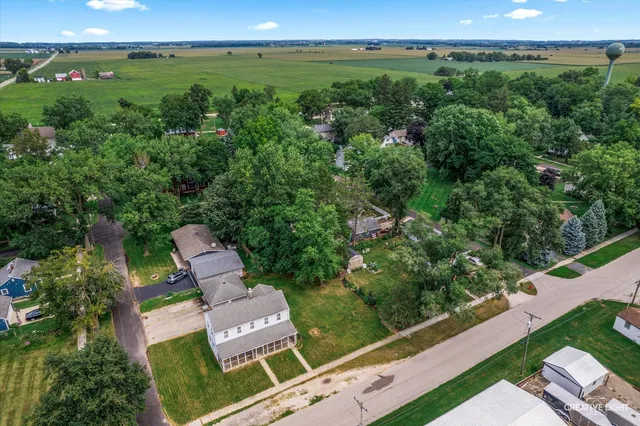 an aerial view of a house with a garden