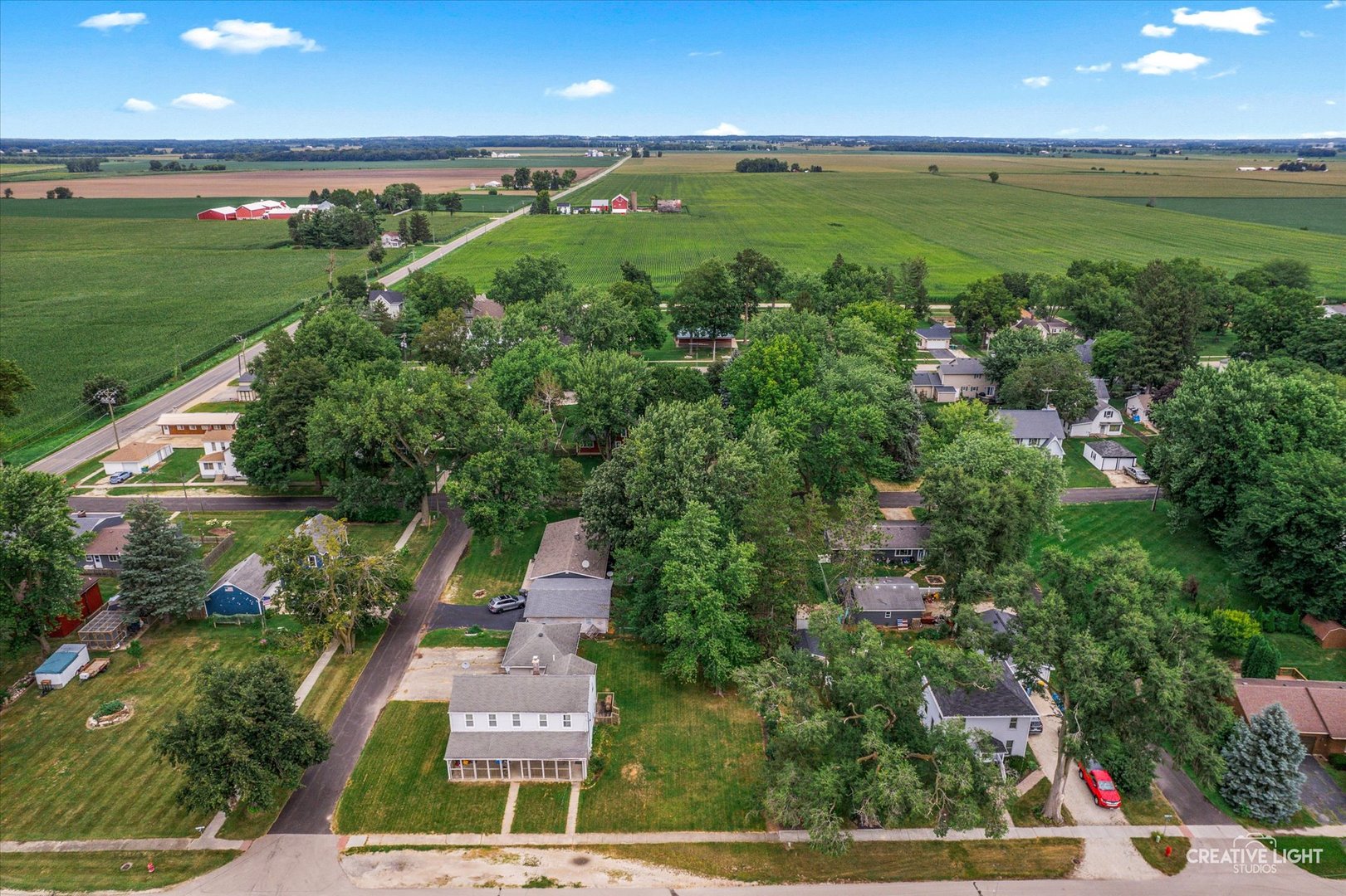 205 Center Street Maple Park, IL 60151 - Photo 8 of 8 an aerial view of a house with a yard and lake view