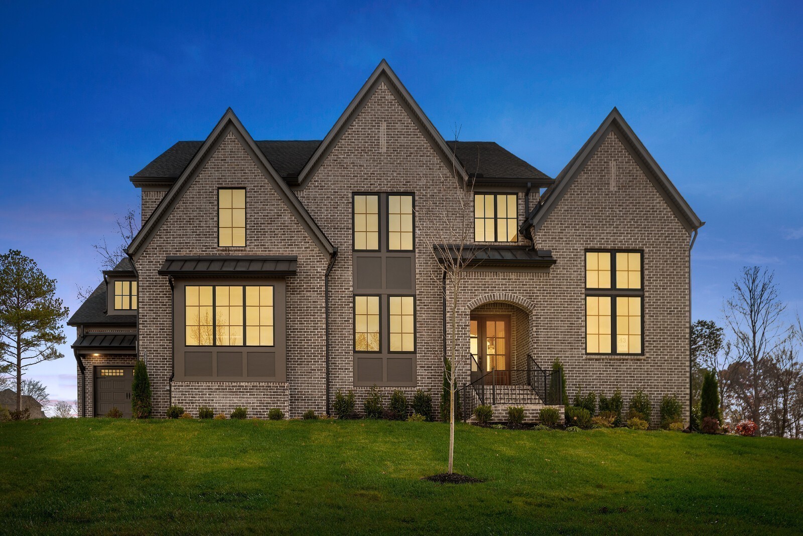 7217 Severide Street Fairview, TN 37062 - Photo 1 of 63 a front view of a house with a yard