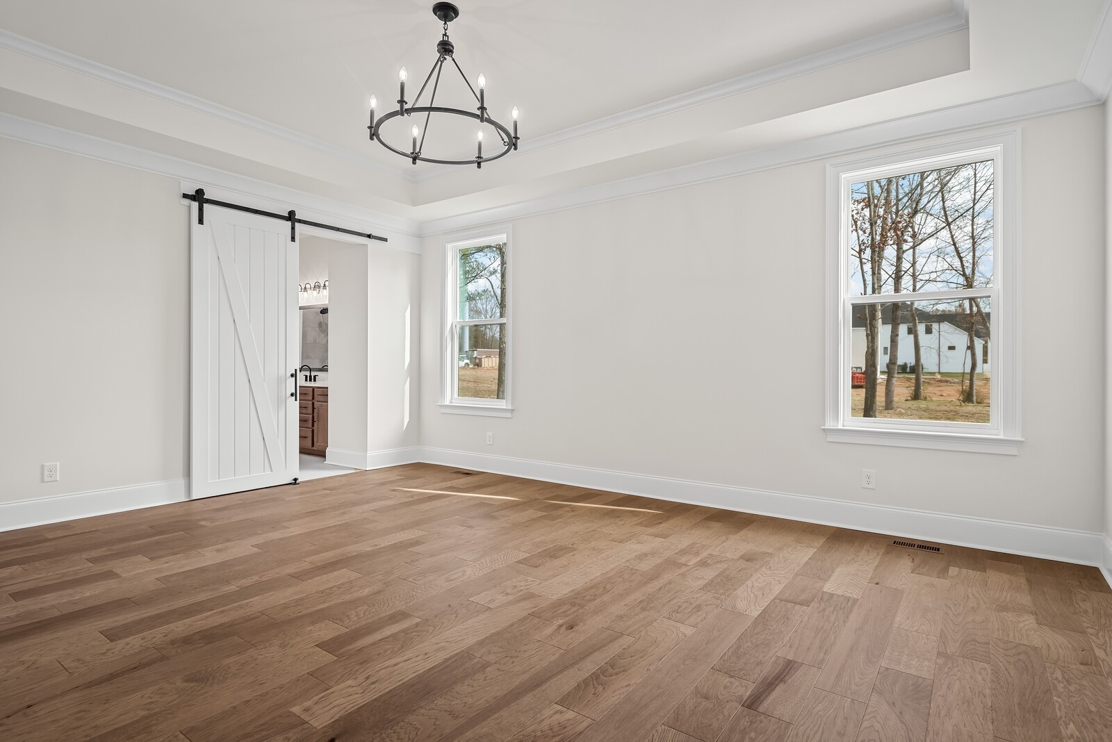 7217 Severide Street Fairview, TN 37062 - Photo 33 of 63 a view of an empty room with a window and wooden floor
