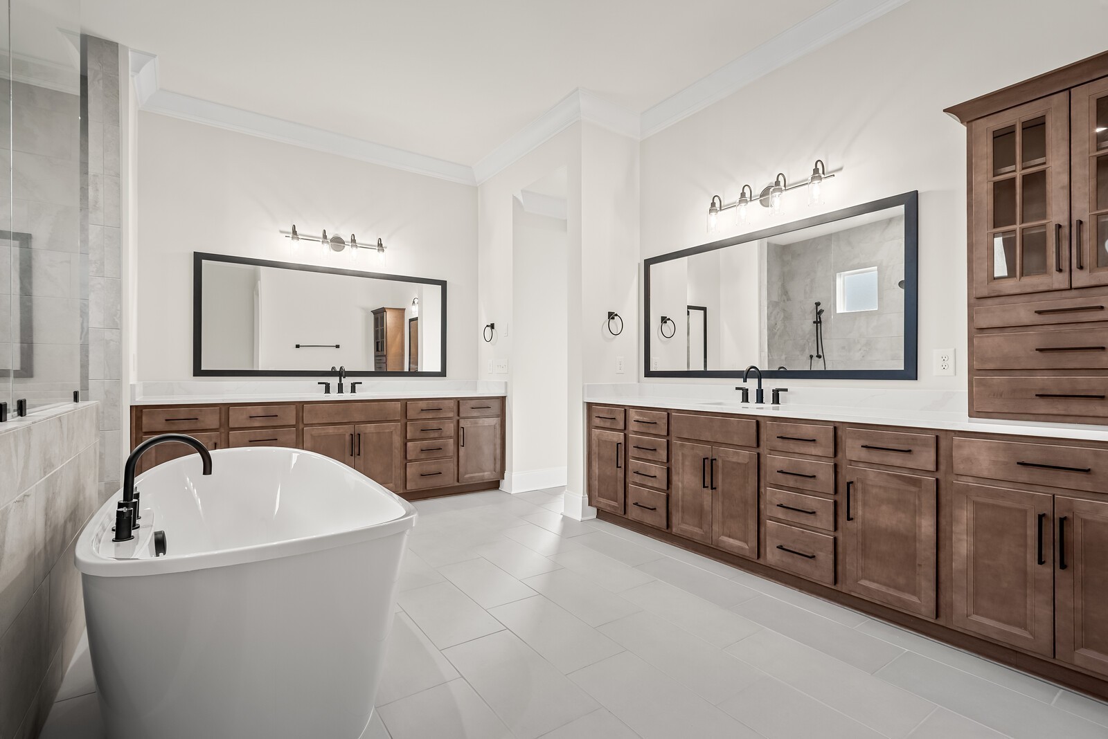 7217 Severide Street Fairview, TN 37062 - Photo 37 of 63 a spacious bathroom with a double vanity sink mirror and bathtub