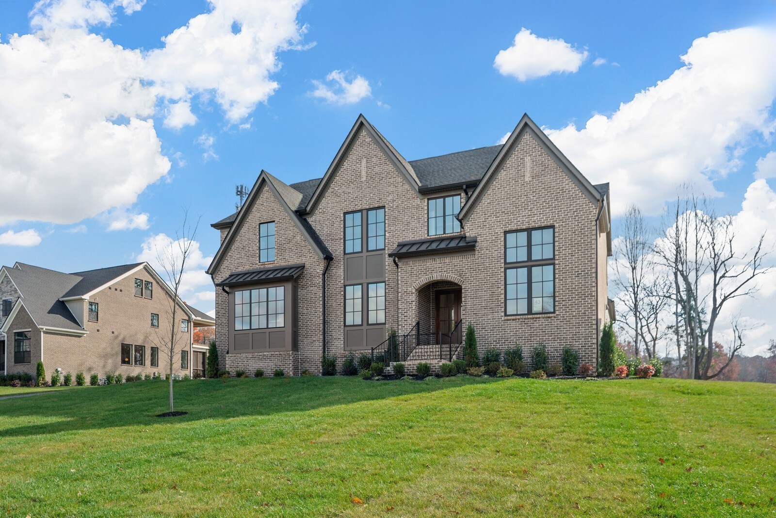 7217 Severide Street Fairview, TN 37062 - Photo 4 of 63 a front view of a house with a yard
