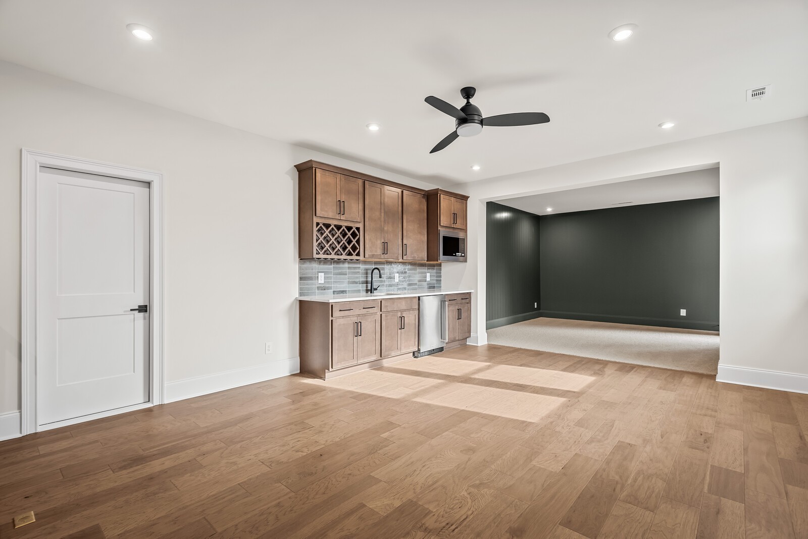 7217 Severide Street Fairview, TN 37062 - Photo 43 of 63 a view of an empty room with kitchen and a window