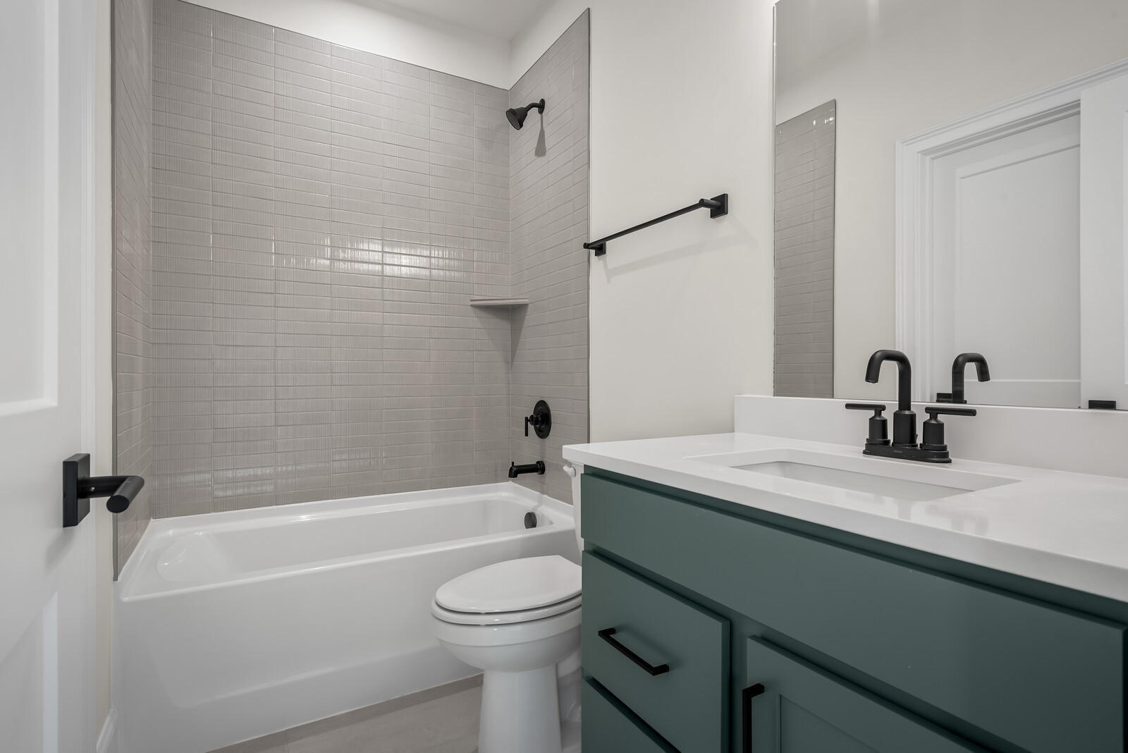 7217 Severide Street Fairview, TN 37062 - Photo 55 of 63 a bathroom with a granite countertop sink a toilet and shower