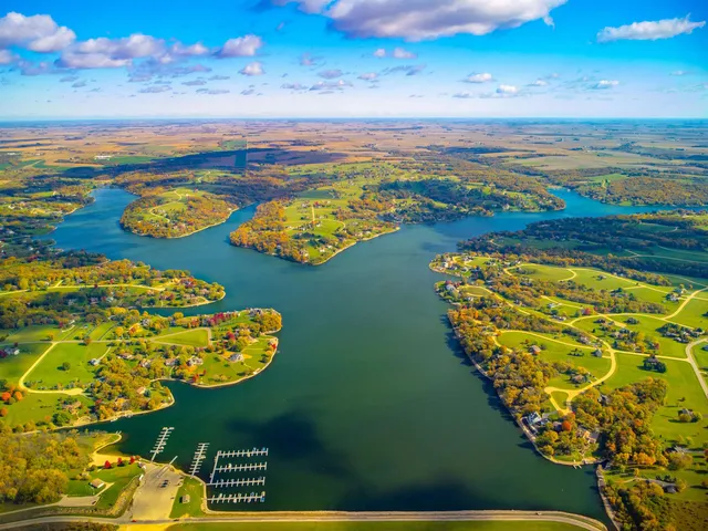 a view of a swimming pool with an ocean view