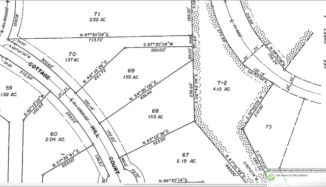 a picture of a room with a white wall and a potted plant