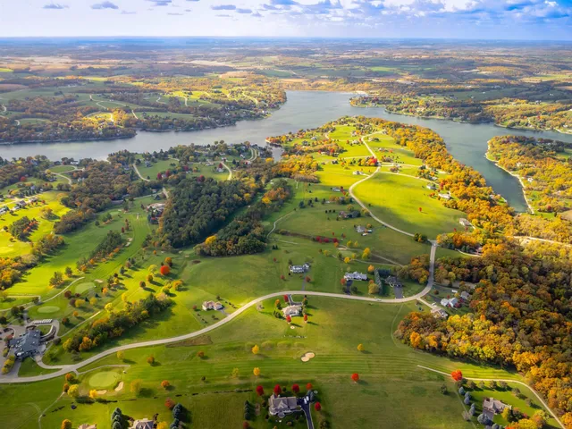 a view of a golf course with a lake
